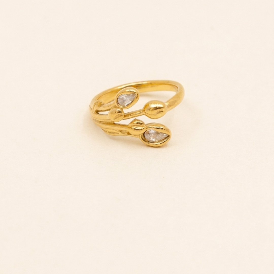 Bague Alba dorée ajustable avec deux motifs goutte et pierres claires