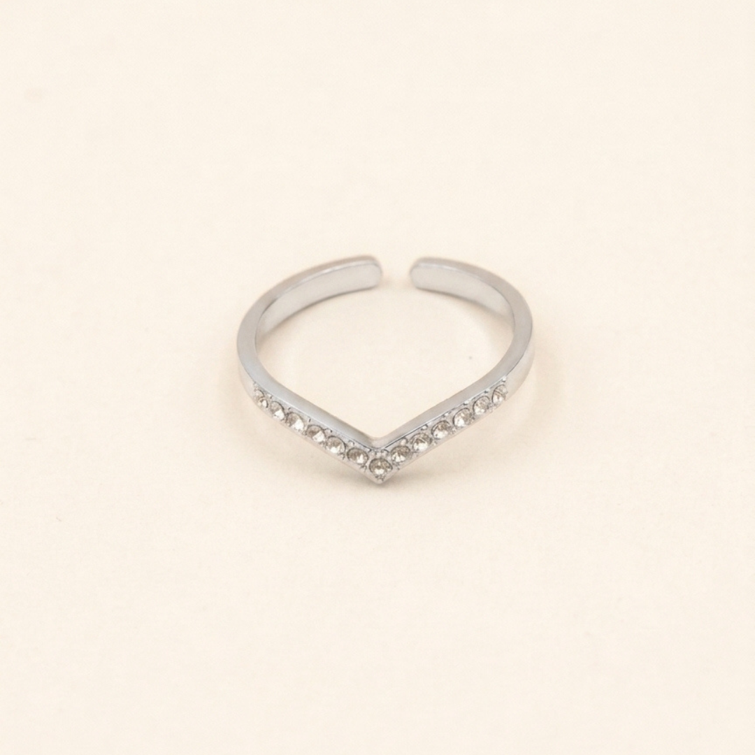 Bague ouverte en forme de cœur, finition argentée, avec détails scintillants