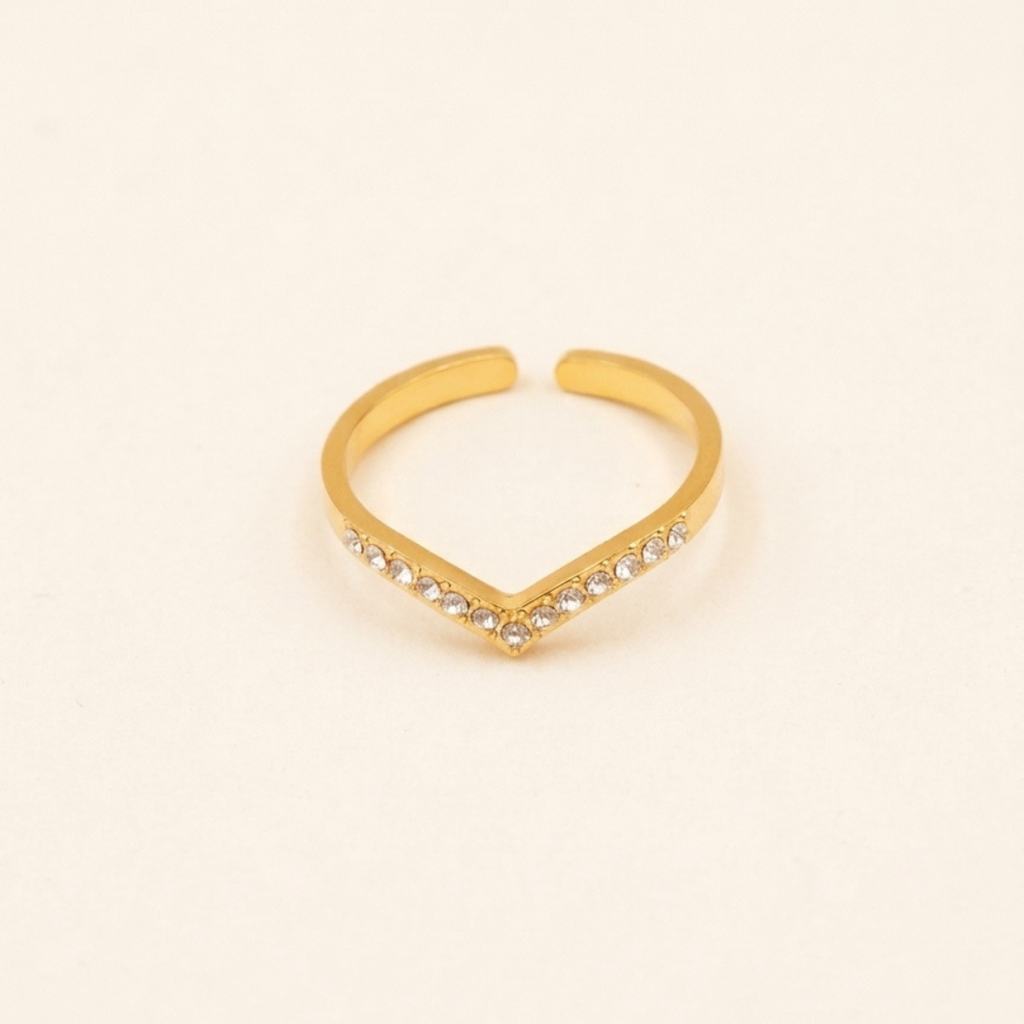 Bague ouverte en forme de cœur, finition dorée, avec détails scintillants
